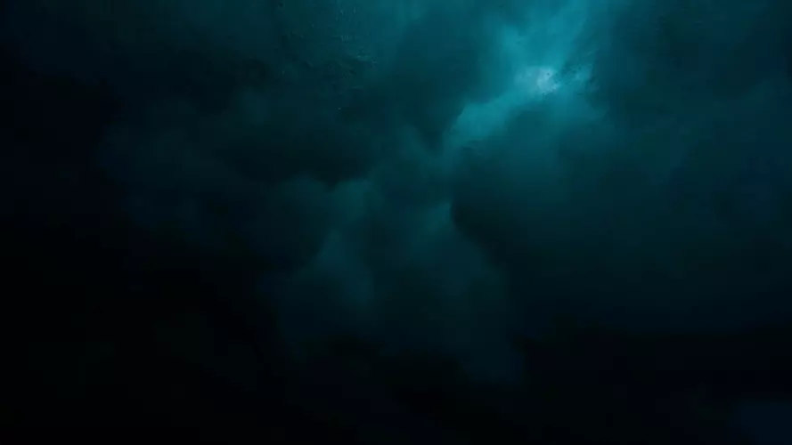A dark underwater scene